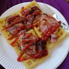 A picture of Potato waffles and bacon.