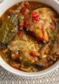 A picture of Kedjenou (spicy chicken stew) (Ivory Coast).