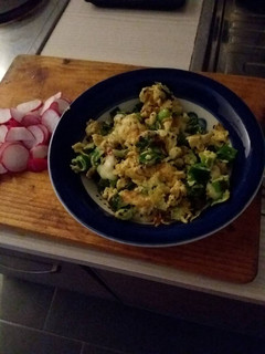 A picture of Eggs with onions and cheese.