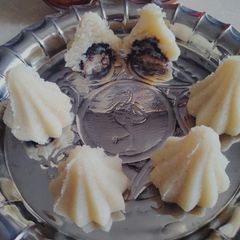 Coconut Modak filled with Apple ganache A picture of Coconut Modak filled with Apple ganache.