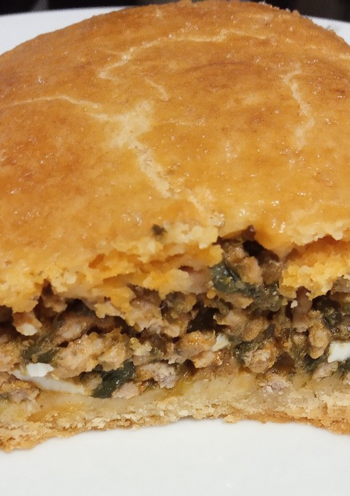 Una foto de Empanada de ternera, espinacas y huevo