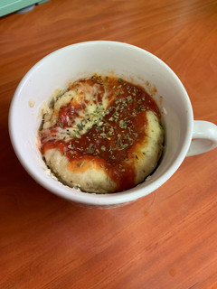 Una foto de Pizza individual en taza