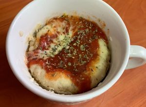 Una foto de Pizza individual en taza