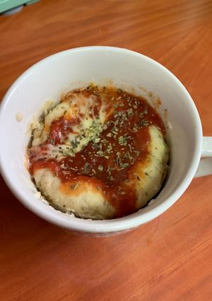 Una foto de Pizza individual en taza