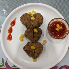 A picture of Corn cutlet.