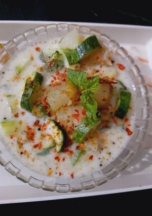 A picture of Buttermilk Raita with Potato and Cucumber.