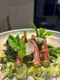 Cabbage&fennel vinaigrette topped with spiced broccolini and prosciutto wrapped asparagus
