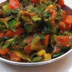 A picture of Green onion carrot vegetable.