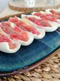 Endivias con sardina ahumada y vinagreta de fresas