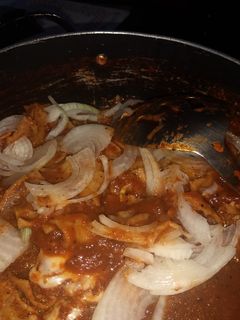 Una foto de Chilaquiles en salsa asada