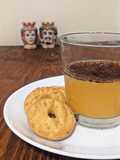 Bicchiere con crema all'arancia e cioccolato
