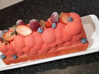Bûche mousse noix de coco et insert fruits rouges