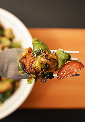 A picture of Parmesan, Almonds and Raisins sautéed Brussels sprouts.