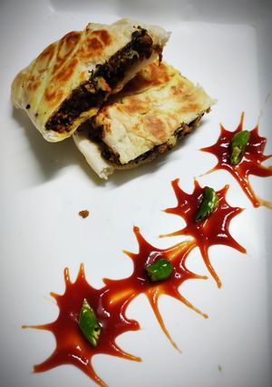 A picture of Spinach soyagranuls stuffed Kulcha warps.