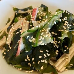 A picture of Cucumber, seaweed and seafood stick with vinegar sauce.