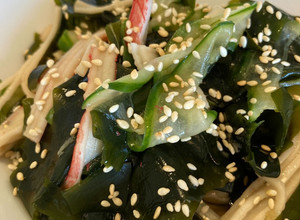 A picture of Cucumber, seaweed and seafood stick with vinegar sauce.
