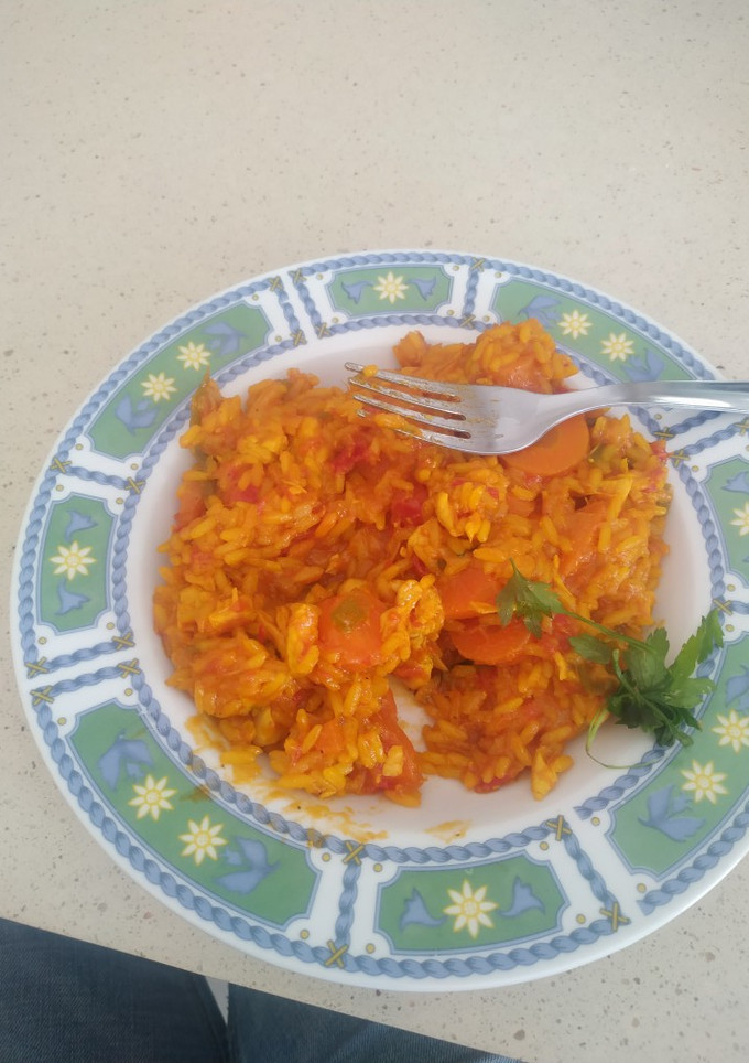 Una foto de Pollo con arroz