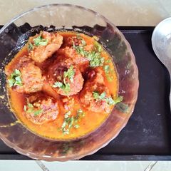 A picture of Kofta curry with leftover pumpkin sabzi.