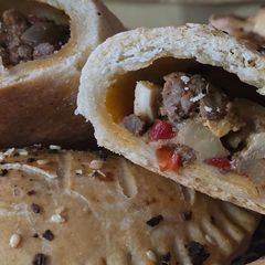 A picture of Argentine empanadas.