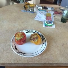A picture of Spinach Artichoke stuffed Peppers.