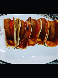 A picture of Naan aloo tikki burger.