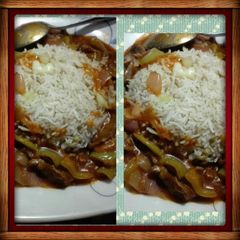 A picture of Lamb chilli with garlic veg rice.