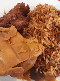 A picture of Local rice and moimoi.