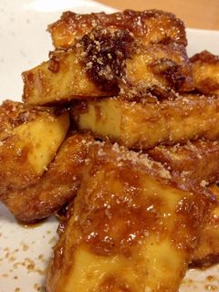 A picture of Thick Fried Tofu with Tasty Sauce.