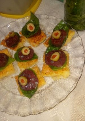 Una foto de Brusquetas de polenta