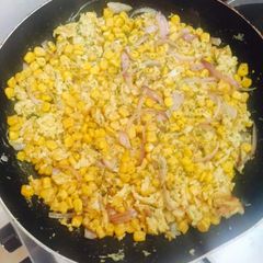 A picture of Sweet corn eggs sauté in butter.