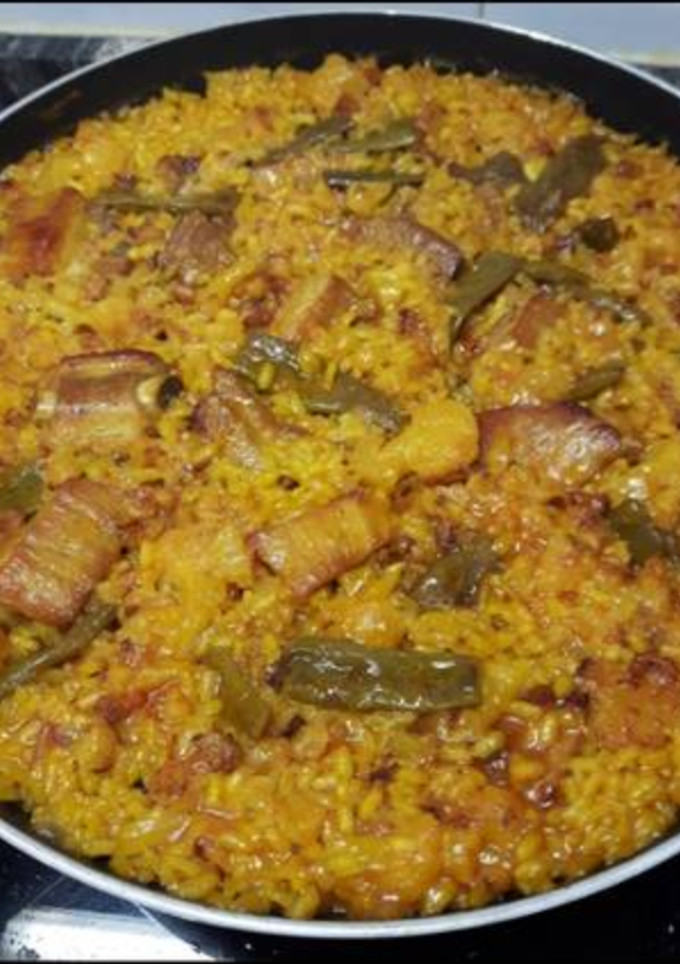 Una foto de Paella de costillas y coliflor