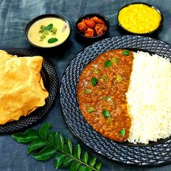A picture of Moong Khattu Platter.