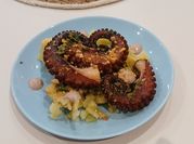 Una foto de pulpo freidora de aire