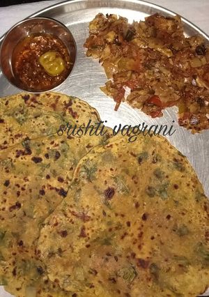 A picture of Leftover Dal palak Paratha with Papad chutney.