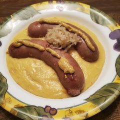 Brad's bratwurst w/ German inspired yellow polenta A picture of Brad's bratwurst w/ German inspired yellow polenta.