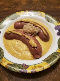 A picture of Brad's bratwurst w/ German inspired yellow polenta.