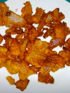 A picture of Crispy onion fries.