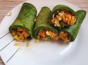 Una foto de Panqueque de espinaca relleno de pollo y verdura
