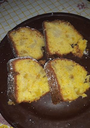 Una foto de Budín de peras manzanas y naranjas