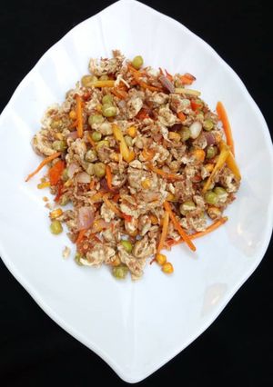 A picture of Scrambled egg with veggies.