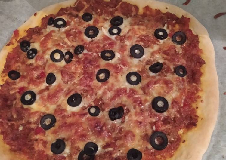 Pizza casera reina de la carne