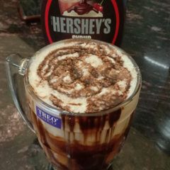A picture of Hershey's chocolate milk shake.