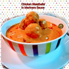 A picture of Chicken Meatballs In Marinara sauce.