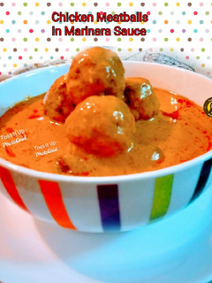 A picture of Chicken Meatballs In Marinara sauce.