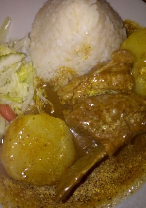 Una foto de Puerquito en salsa de pachamanca