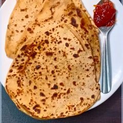 A picture of Tikona paratha.