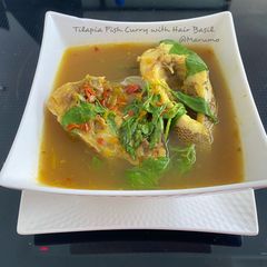 A picture of Tilapia Fish Curry with Hair Basil.