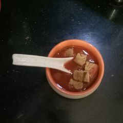 A picture of Tomato Carrot Soup.