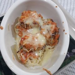 A picture of Cheesy Noodles with Dumplings.