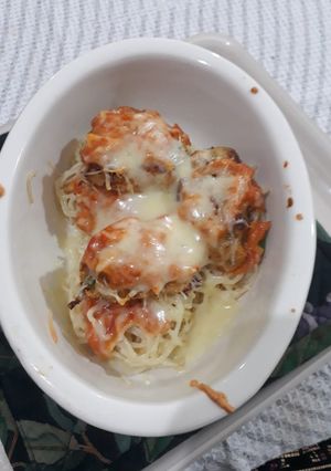 A picture of Cheesy Noodles with Dumplings.